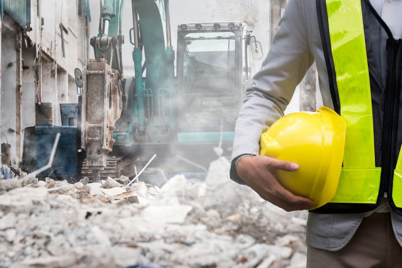 Demolition Professionals Operating Machinery